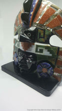 Mask of the sun with inlays