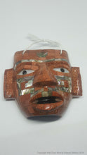 Miniature ceremonial masks with inlays (several figures)