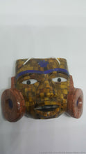 Miniature ceremonial masks with inlays (several figures)