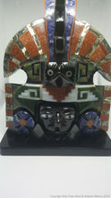 Mask of the sun with inlays