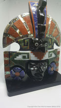 Mask of the sun with inlays